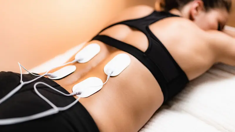 Transcutaneous Electrical Stimulation of Woman Transcutaneous Electrical Stimulation of Woman