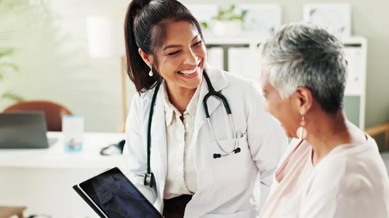 Doctor advising older patient