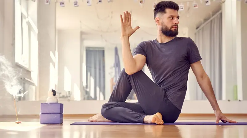 Man in a yoga pose Man in a yoga pose