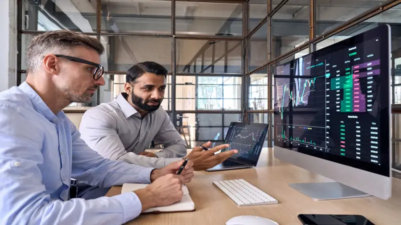 two men trading online stocks two men trading online stocks
