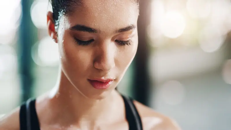 female athlete sweating after workout