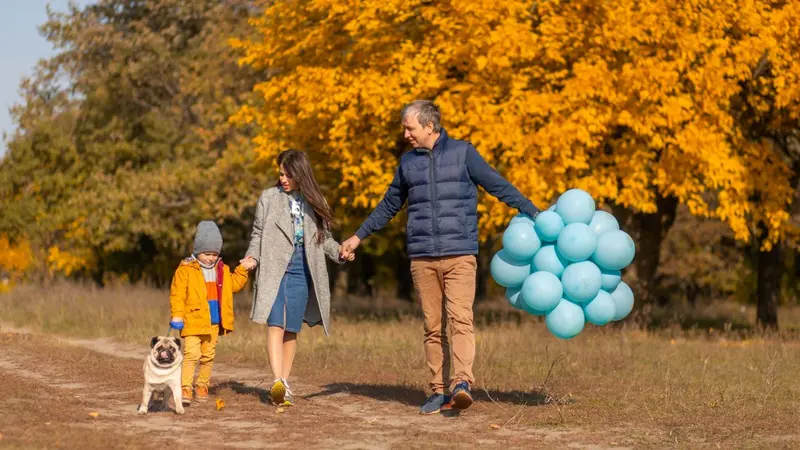 Family walking on an autumn day