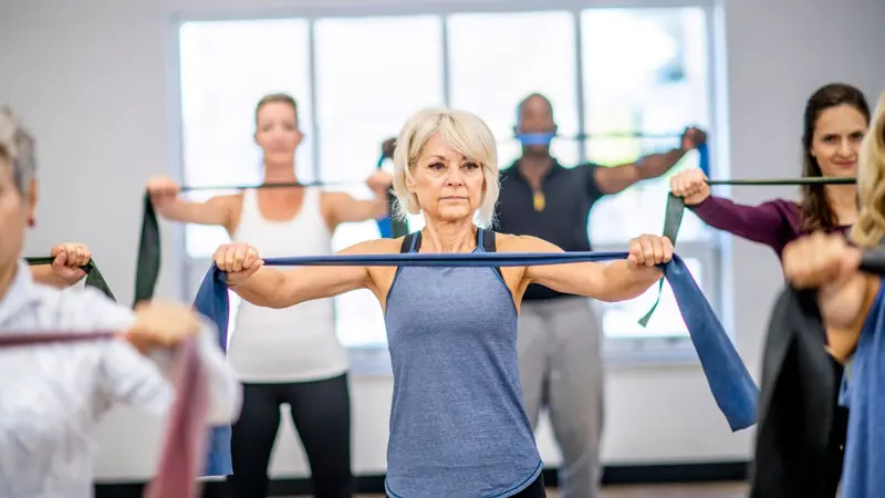 Woman doing resistance training in a class
