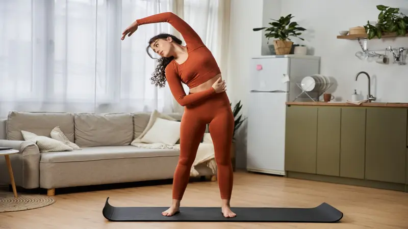 Woman exercising at home