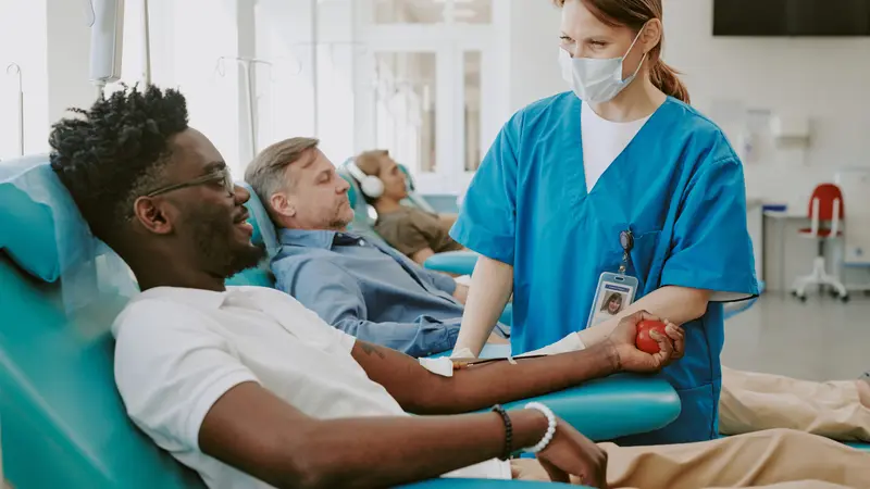 man receives treatment during clinical trials