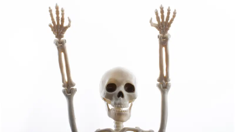 Skeleton waving its arms in the air
