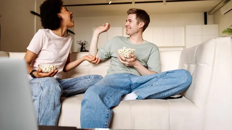 Couple eating popcorn