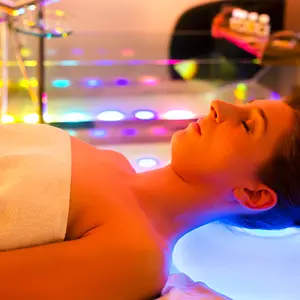 woman receiving Chromotherapy