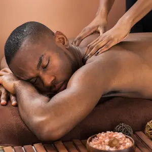 man receiving a back Massage