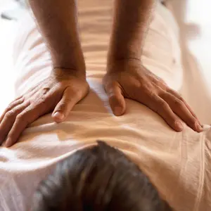 woman receiving Shiatsu Massage