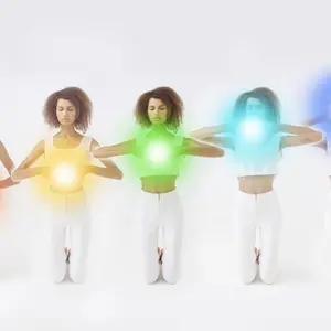 Colored chakra lights over woman body