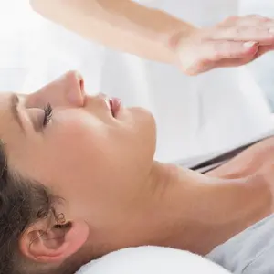 woman receives Reiki