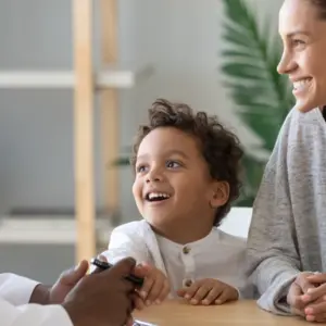 mom and little preschooler son visiting family doctor