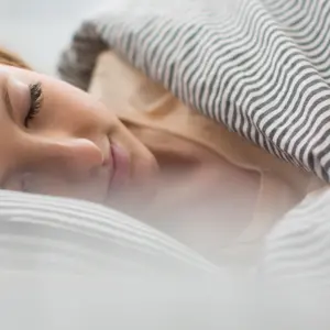 woman sleeping in bed