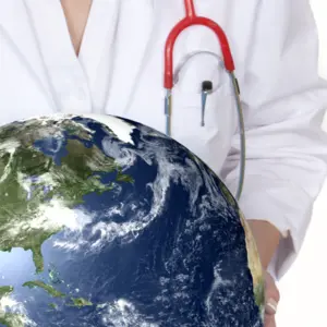 Physician holding plant earth in her hands. 