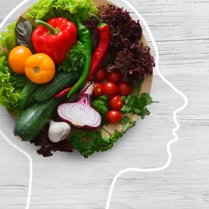 Fresh vegetables in woman head symbolizing health