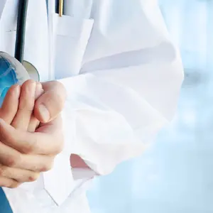 Doctor hand holding a symbolic globe