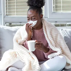 woman has runny nose and common cold woman has runny nose and common cold