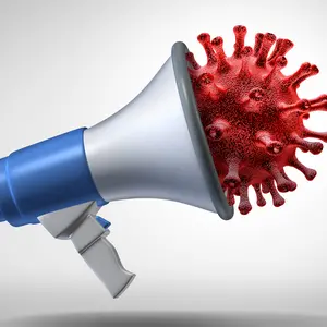 coronavirus pandemic information as a covid-19 blowhorn or megaphone as a 3D illustration.
