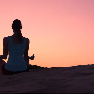 Relaxing yoga on the beach