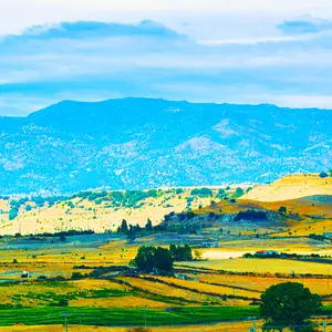 Agricultural fields in Nuoro at Mount Ortobene. Panorama and landscape in Sardinia island of Italy. Scenery of Sardegna in summer. 