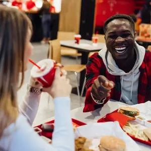 Couple enjoying fast food