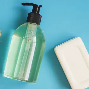 Handwashing bath products. Hand sanitizer and soap bar, sponge flat lay photography. Wash hands, hygiene concept.