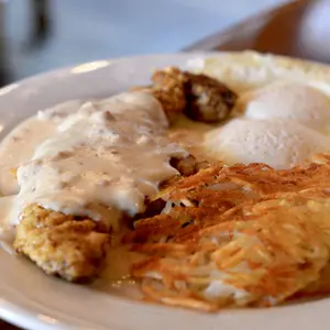 Country Fried Steak breakfast with eggs and hash browns