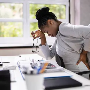 Woman Sitting In Office