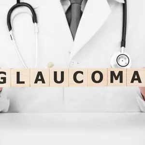 Doctor holds wooden cubes in his hands with text GLAUCOMA Doctor holds wooden cubes in his hands with text GLAUCOMA