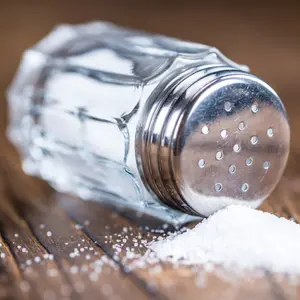 Old wooden table with a Salt Shaker