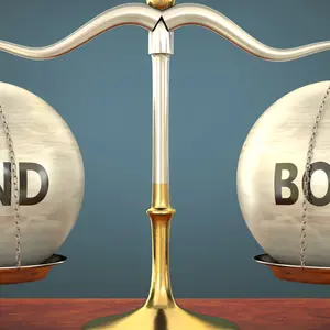 Metaphor of mind and body staying in balance - shown as a metal scale with weights and labels mind and body