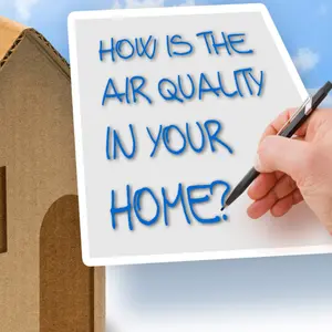 HOW IS THE AIR QUALITY IN YOUR HOME? - concept with a cardboard house