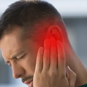 Man suffering from tinnitus