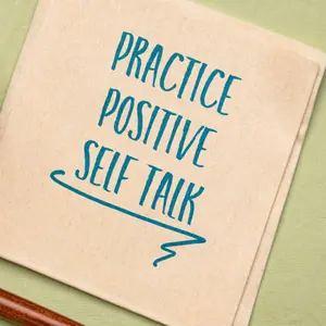 practice positive self talk - insoirational advice on a napkin with a cup of coffee, positive affirmation and personal development concept