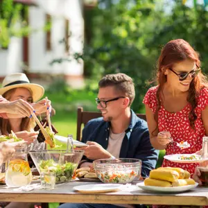 sharing salad at summer garden part