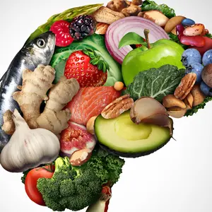 Healthy brain food to improve mental health concept - nutritious nuts fish vegetables and berries rich in omega-3 fatty acids, vitamins, minerals