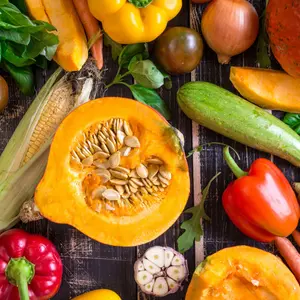 Fresh Autumn vegetables on a dark table. 