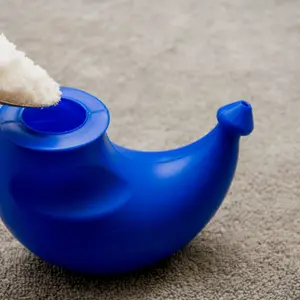 Neti pot and salt for nasal irrigation Neti pot and salt for nasal irrigation