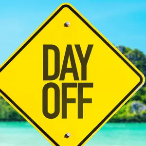 Day Off sign with beach background