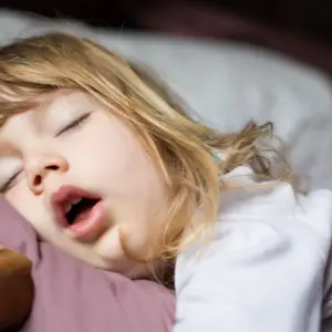 Child sleeping with an open mouth