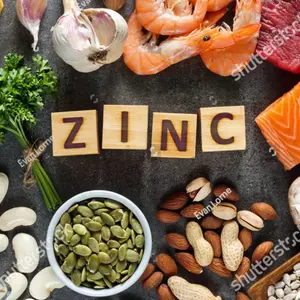Foods High in Zinc as salmon, seafood-shrimps, beef, yellow cheese, parsley leaves, mushrooms, cocoa, pumpkin seeds, garlic, bean, almonds, pine nut