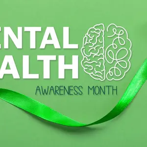 Green ribbon and text MAY IS MENTAL HEALTH AWARENESS MONTH