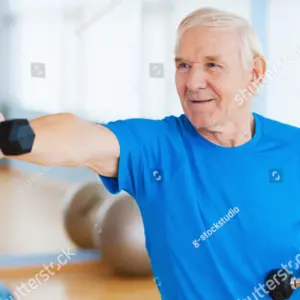 senior man exercising with dumbbells 