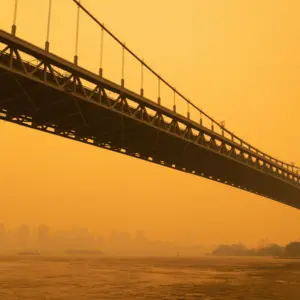 The Triborough Bridge along the East River in New York City with Massive Air Pollution from Wildfires