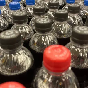 Soda tops display of cola