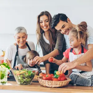 Family around food on the kitchen counter