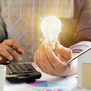 Man holding a lightbulb