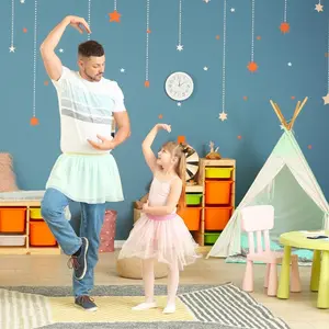Father and daughter practicing ballet