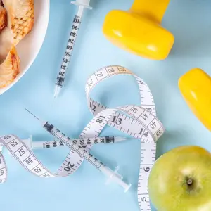 Vector for weight loss including syringes, weights and food Vector for weight loss including syringes, weights and food
